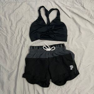 victoria secret sports bra and pink shorts.